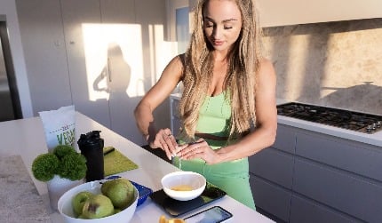 Coach preparing a healthy meal in a kitchen